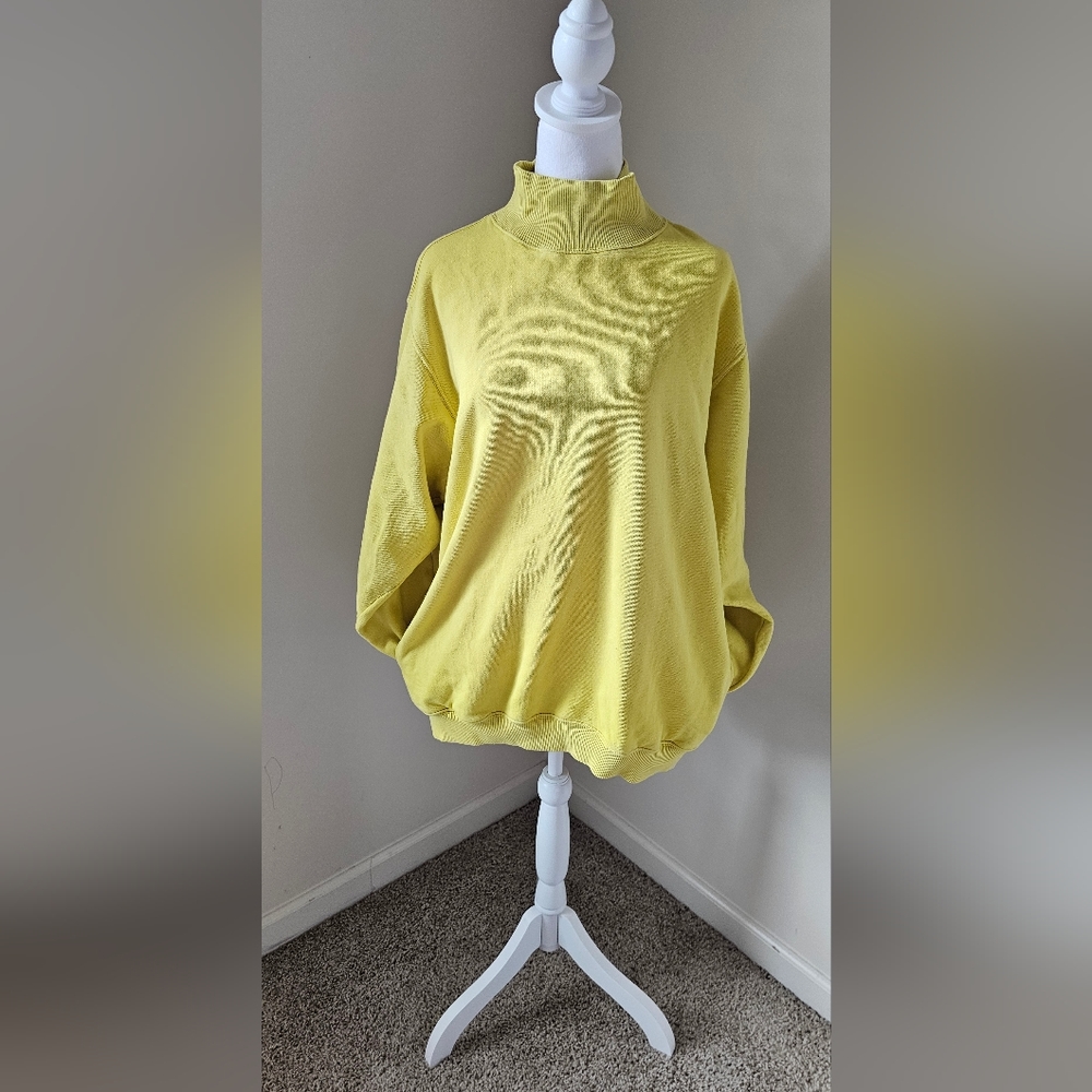 Junior girl's yellow turtle neck sweater. Extra long.Just tried it on one time.